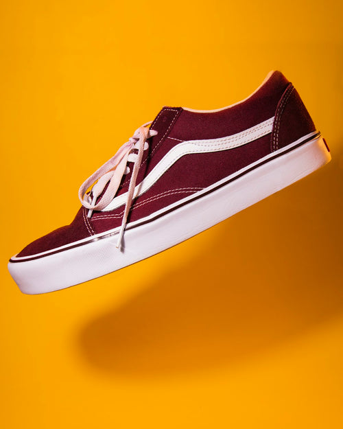 Maroon canvas low-top plimsoll shoe