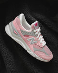 Pink, grey and white New Balance sneaker