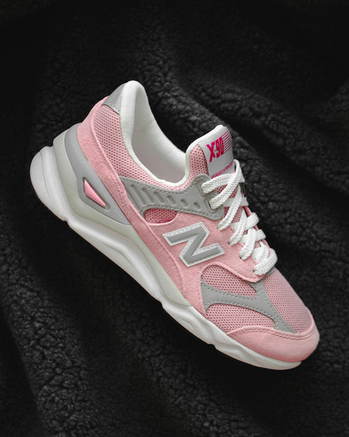 Pink, grey and white New Balance sneaker