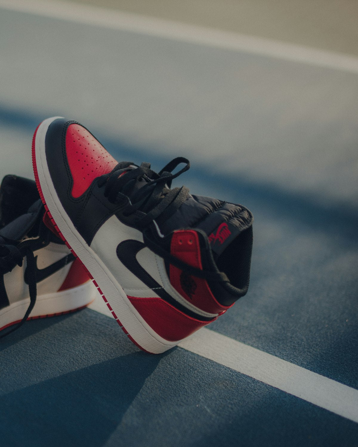 Black, white and red high-top basketball sneakers