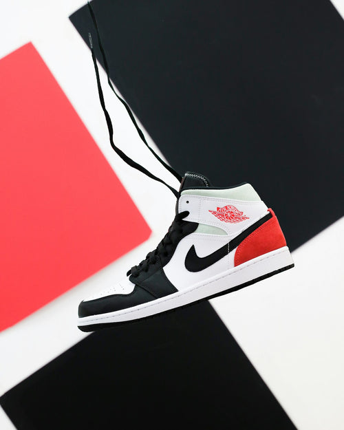 Black and white high-top canvas sneakers